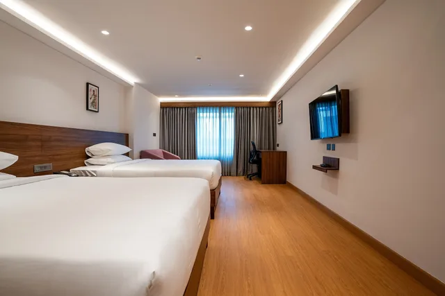 غرفة عائلية بسريرين كوين، Lilac Hotel, Guruvayur 1/4