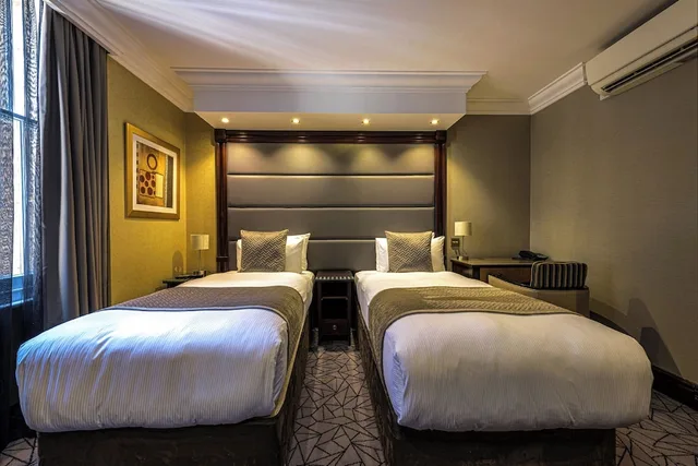 غرفة كلوب بسريرين منفصلين، Hyde Park International Hotel 1/6