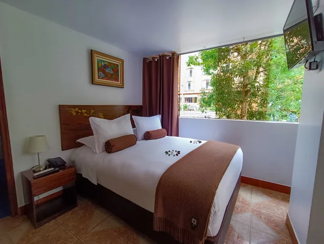 غرفة سوبيريور عائلية بسرير كينج وسرير فردي، Hotel Retama Inn Machu Picchu 1/2