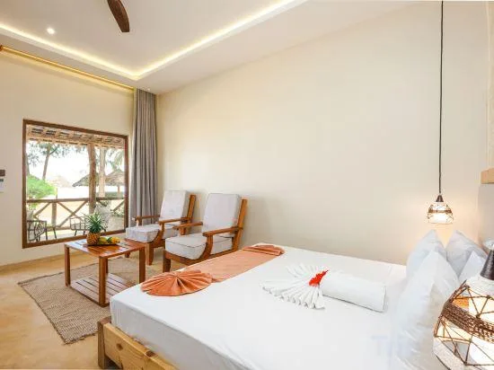 بنغل بسرير كينج بإطلالة على البحر، Tanzanite Beach Resort 1/1