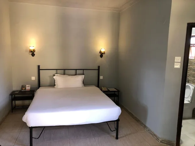 غرفة اقتصادية بسرير كوين، Meley Impala Hotel 1/2