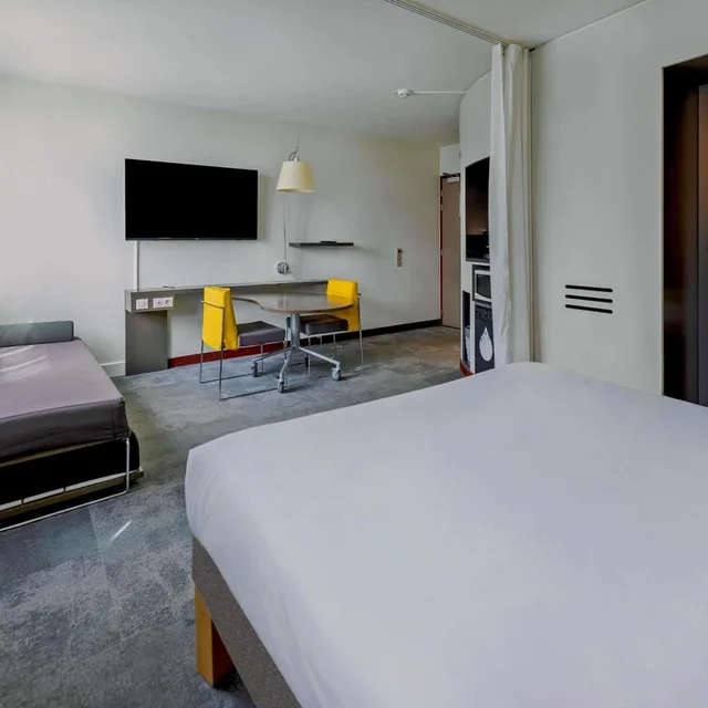 جناح سوبيريور بسرير مزدوج وسرير فردي مع أريكة، Novotel Suites Paris Stade De France 2/10