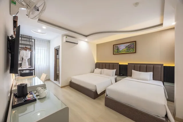 غرفة عائلية ثلاثية بسرير كوين وسرير فردي، A25 Hotel - 65G Nguyen Thai Hoc 7/10