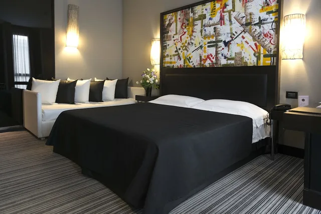 غرفة قياسية ثلاثية بسرير مزدوج وسرير فردي، Twentyone Hotel 1/2