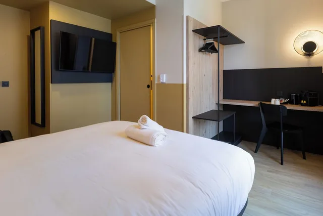 غرفة سوبيريور عائلية مفردة بسرير كوين مع أريكة، All Suites Hotel Paris Pleyel L’Ile Saint Denis 3/10