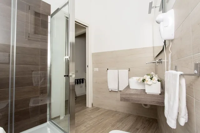 غرفة ديلوكس بسرير كوين وسرير فردي، Residence Le Vie Del Centro 7/7