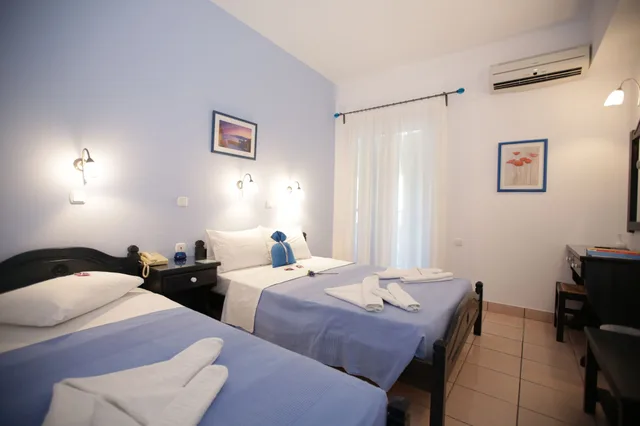 غرفة سوبيريور ثلاثية بسرير مزدوج وسرير فردي، DILION HOTEL 1/5