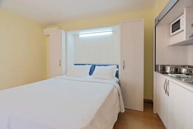غرفة عائلية بسرير مزدوج بإطلالة على الحديقة مع أريكة، Garajau Madeira Hotel - Ocean & Nature Apartments 1/3