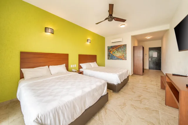 Standard, Double Bed, Side View، Villas Coral Huatulco 1/4