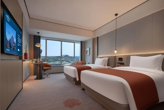 غرفة سوبيريور بسريرين منفصلين للمدخنين، Howard Johnson Airport Hotel Changsha 2/4