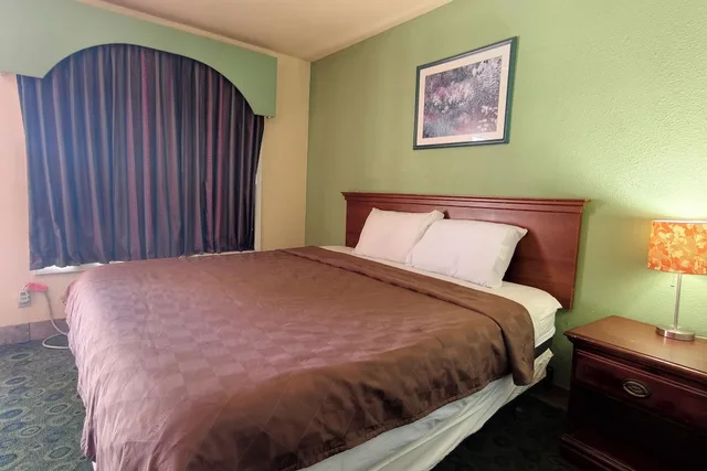 King Bed Non-Smoking, Sunset Lodge Elgin near US 290 by Hotel O 1/10