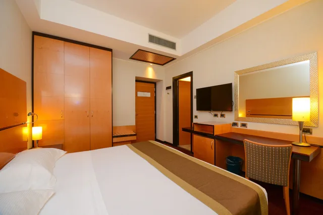 غرفة رباعية بسريرين منفصلين وسرير بطابقين، Hotel Igea 1/10
