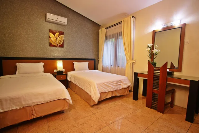 Lily, Twin Beds، Grand Ussu Hotel And Convention 1/2