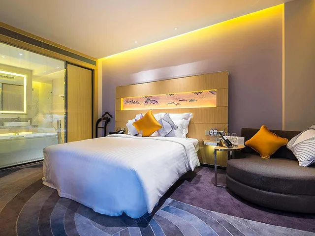 جناح ديلوكس بسرير كينج وسرير كوين، Novotel Suzhou Sip 2/4