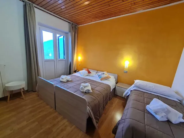 غرفة كومفورت ثلاثية بسرير كوين وسرير فردي، Hotel Excelsior Cimone 2/8