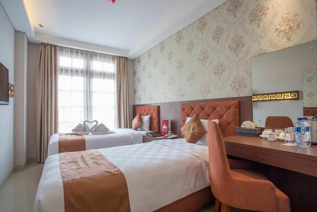 غرفة سوبيريور بسريرين منفصلين بإطلالة على المدينة، Prima In Hotel Malioboro 2/6