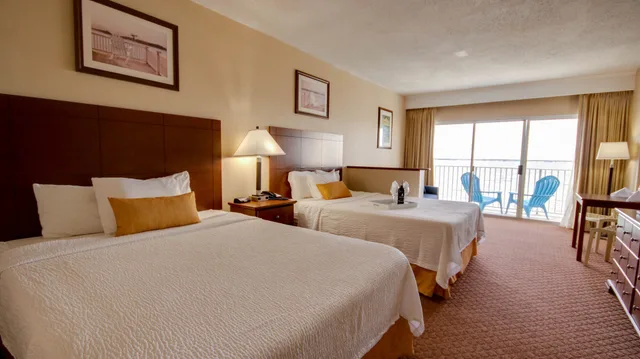 Efficiency, Deluxe, 2 Queen Beds, Bay View, Sofa, South Building، Princess Bayside Beach Hotel 2/10