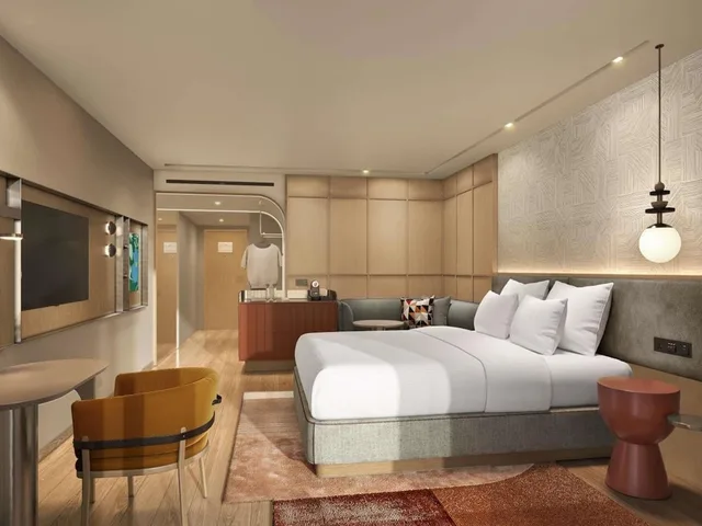غرفة ديلوكس تنفيذية بسريرين منفصلين بإطلالة على المدينة مع دخول صالة النادي، Pullman Kuching 4/6
