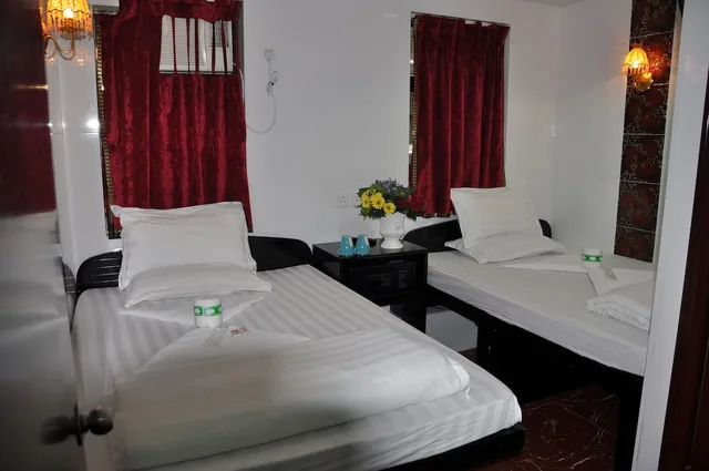 غرفة ثلاثية بسرير مزدوج وسرير فردي، New Guangzhou Guest House 1/4