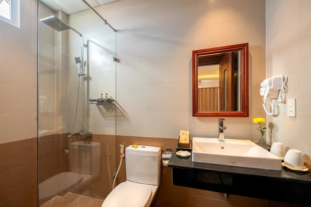 غرفة ديلوكس ثلاثية بسرير كوين وسرير فردي، Iris Villa Hoi an 3/4