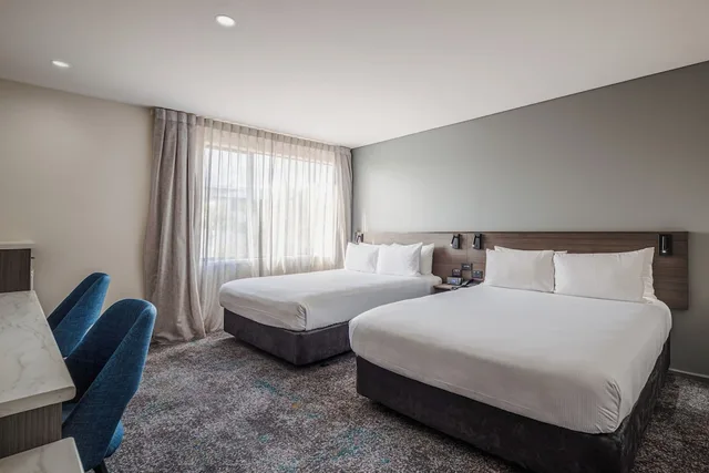 غرفة متصلة سوبيريور بسريرين كوين، Heartland Hotel Auckland Airport 2/7