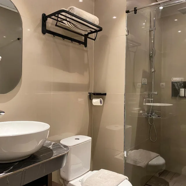غرفة ديلوكس بسرير فردي، Avery de Grand City Hotel Bandung 3/4