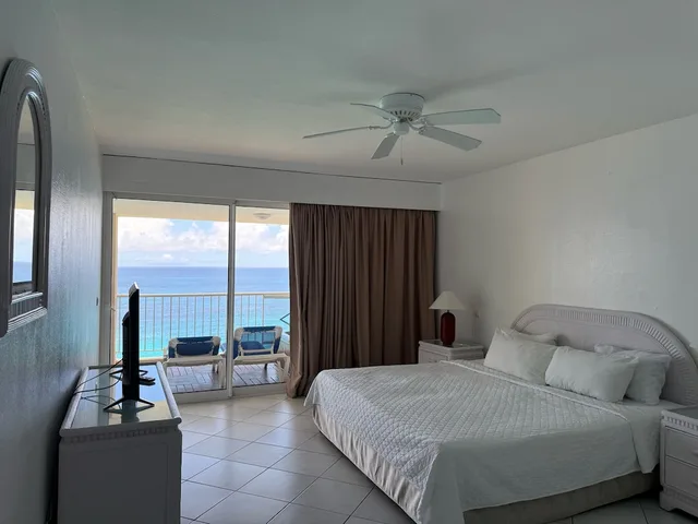 جناح جونيور بسرير كينج وسرير بطابقين بإطلالة على البحر بغرفتي نوم، Sapphire Beach Club and Resort 1/8