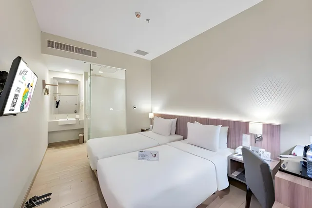 غرفة بريميير بسريرين منفصلين، Grand Whiz Megamas Manado 1/2