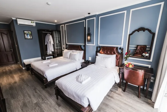غرفة عائلية ثلاثية بسرير كوين وسرير فردي بإطلالة على المدينة بشرفة، Suddha Boutique Hotel 7/10