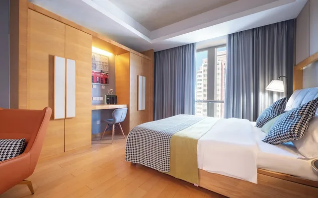 غرفة ديلوكس بسرير كينج بإطلالة على الحديقة، Sanlitun Xin Xiang Ya Yuan Apartment 5/9