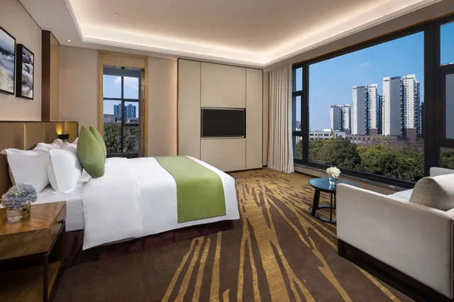 غرفة ديلوكس بسرير كينج للمدخنين، Ramada by Wyndham Leshan 9/10