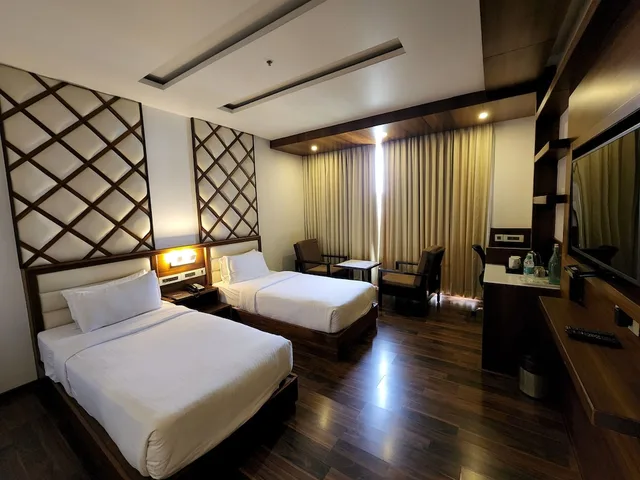 غرفة ديلوكس بسريرين منفصلين، Hotel Preethi International 2/4