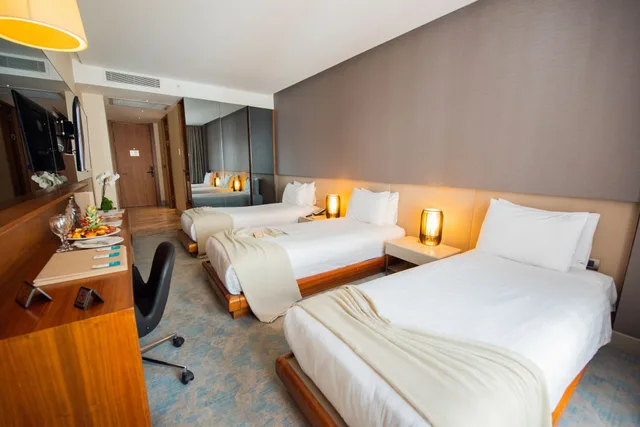 غرفة قياسية ثلاثية بثلاثة أسرّة، Dosso Dossi Hotels and SPA Downtown 1/7