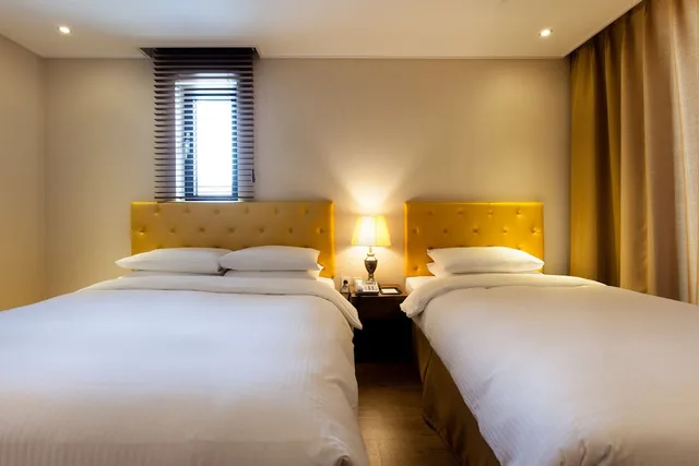 غرفة ديلوكس بسرير مزدوج وسرير فردي، Haema Hotel 1/8