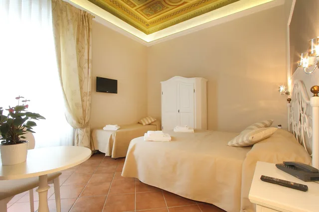 غرفة ثلاثية بسرير مزدوج وسرير فردي، Hotel Ferrucci Firenze 3/10