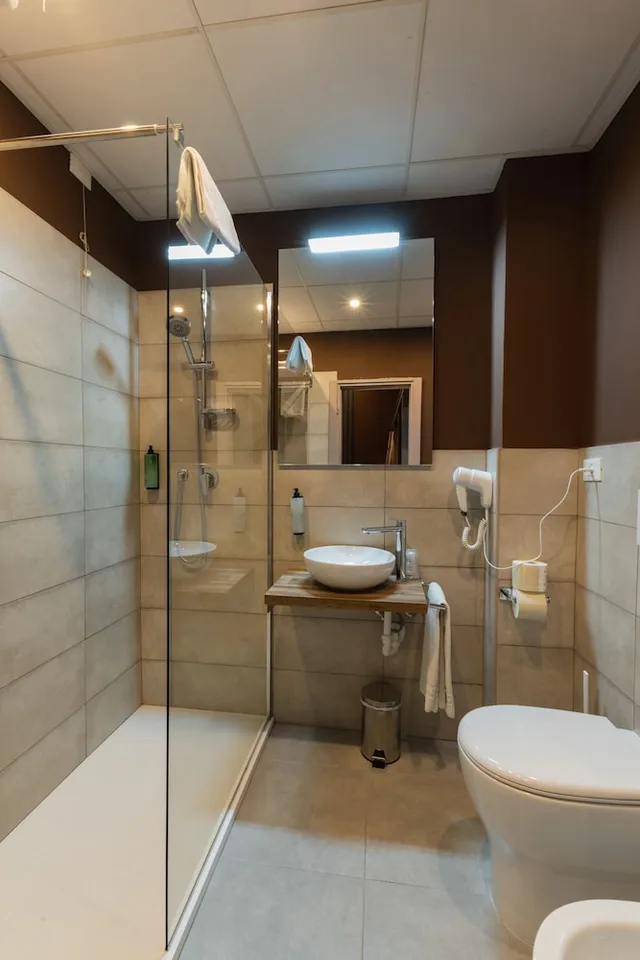 غرفة ثلاثية بثلاثة أسرّة، Hotel Unicorno 4/6