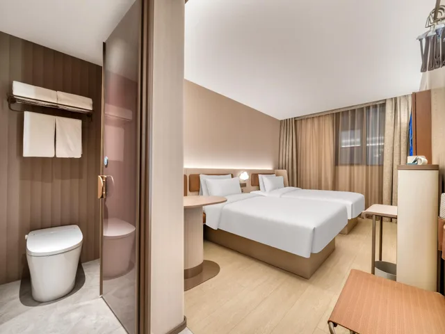 غرفة بزنس بسريرين منفصلين، Hanting Hotel Xihu Xiebai 1/1