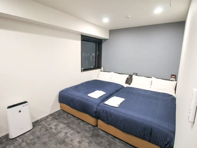 غرفة بسريرين منفصلين، HOTEL LiVEMAX Nagoya Kanayama 1/4