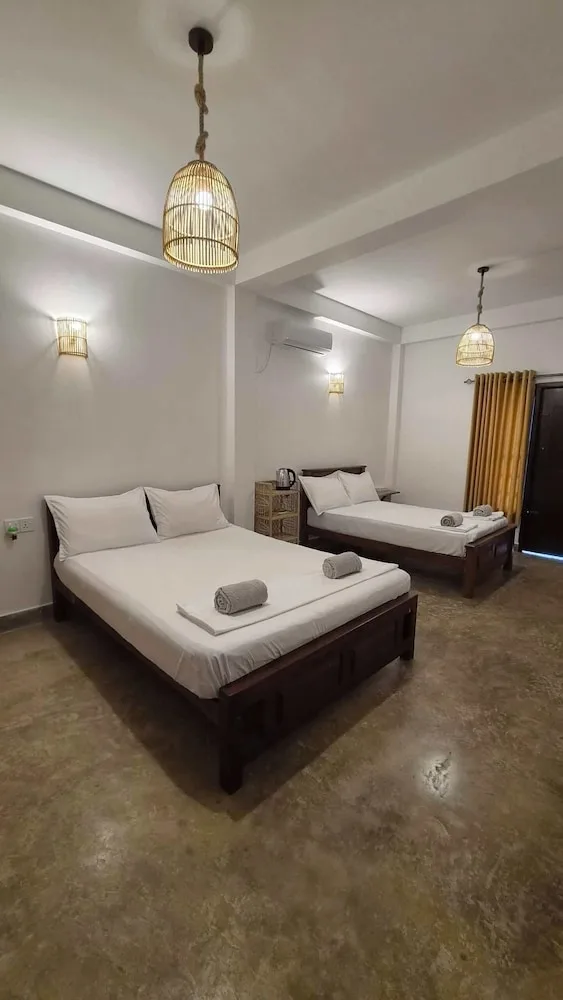 غرفة عائلية بسرير كوين وسرير فردي، Riverside Cabanas 2/10