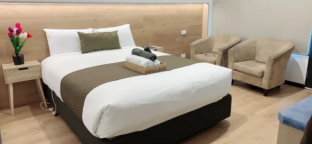 غرفة ديلوكس بسرير كوين، Elm Motel 1/5