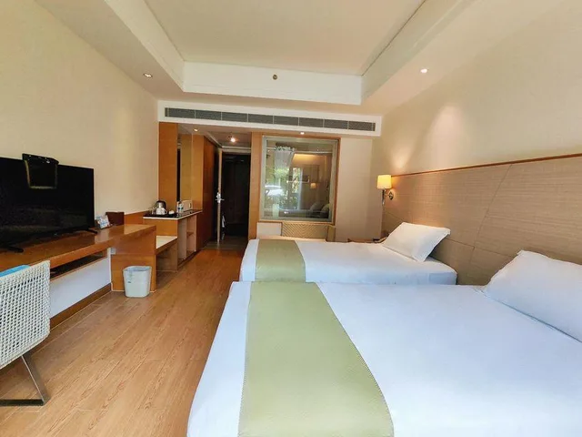 غرفة بسريرين منفصلين بإطلالة على الحديقة، Ocean View Resort Yalong Bay 1/2