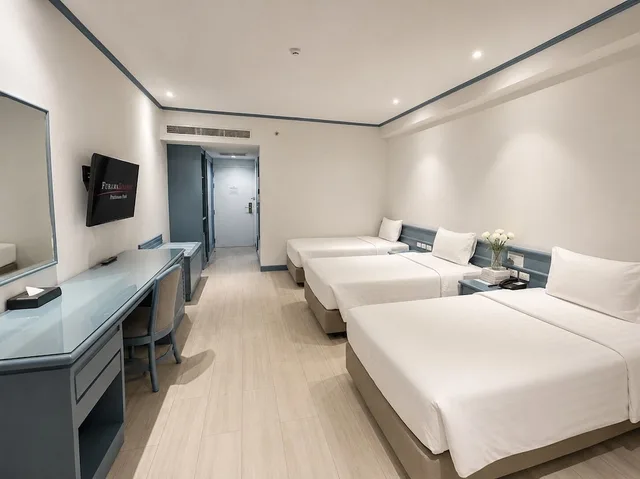 غرفة ثلاثية بسرير كينج، Furamaxclusive Pratunam Park Hotel 1/10