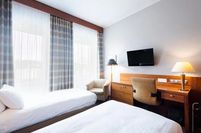 غرفة ثلاثية، Grand Hotel International 1/1