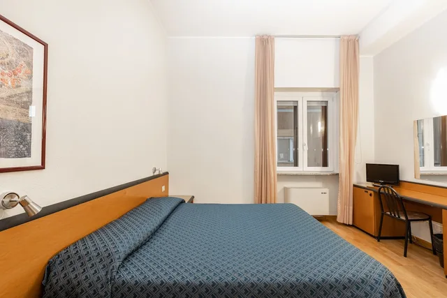 غرفة قياسية ثلاثية بسرير كوين وسرير فردي، Hotel Nuova Grosseto 2/3