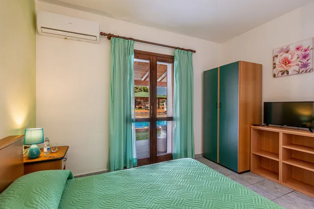 غرفة كلاسيكية بسرير كوين، Marina Manna Hotel Club Village 1/5