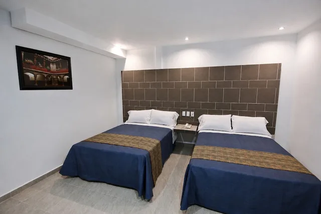 غرفة عائلية بسرير كينج وسرير فردي، First Inn Hotel and Business 3/10