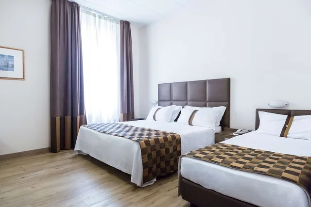 غرفة كلاسيكية ثلاثية بسرير كينج وسرير فردي، Best Western Hotel Liberta 3/5