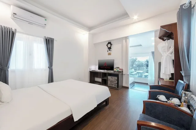 غرفة عائلية بسرير كوين وسرير فردي، A25 Hotel Quang Trung 4/6