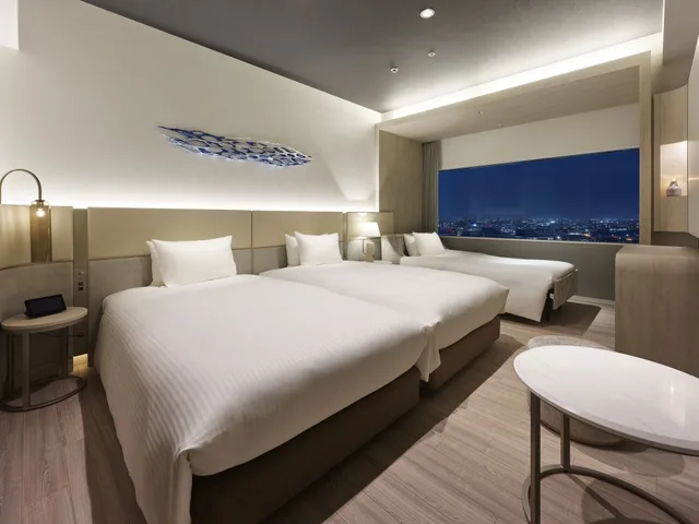 غرفة ديلوكس بسريرين مع سرير إضافي، Mitsui Garden Hotel Yokohama Minatomirai Premier 1/3