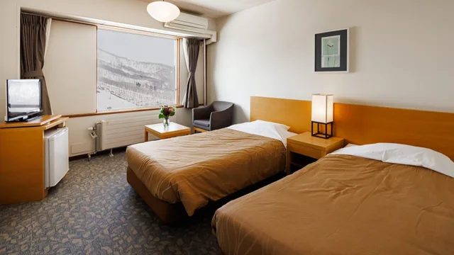 غرفة غربية بسريرين منفصلين في المبنى الرئيسي، Madarao Kogen Hotel 1/1